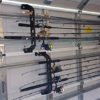21-inch Cobra Garage Storage Rack with clamping hardware, perfect for organizing fishing rods, tools, and gear in the garage