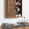 Kate and Laurel Cates Wood Wall Storage Cabinet with Sliding Barn Door