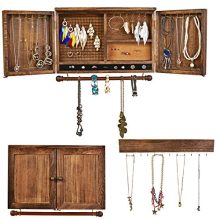 Wooden jewelry organizer with barn door design, mesh earring panel, necklace hooks, ring slots, and cork board