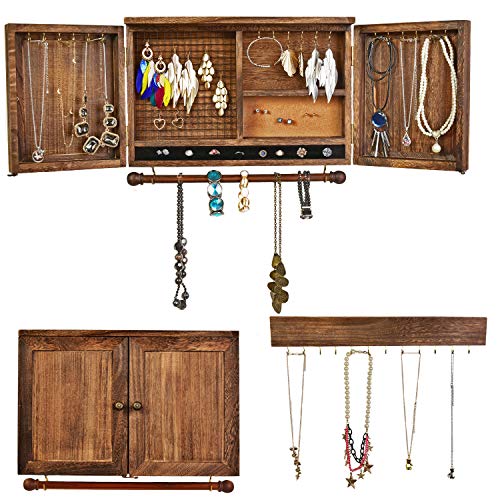 Wooden jewelry organizer with barn door design, mesh earring panel, necklace hooks, ring slots, and cork board