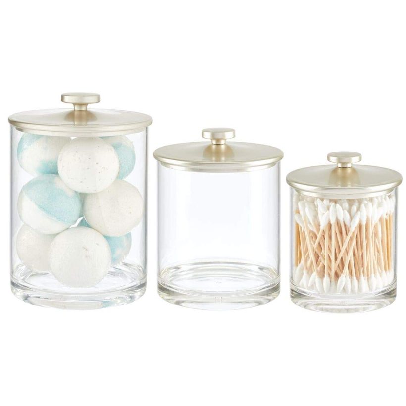 Clear and matte satin plastic canister set with lids, perfect for bathroom countertops, storing cotton swabs, bath salts, and makeup sponges
