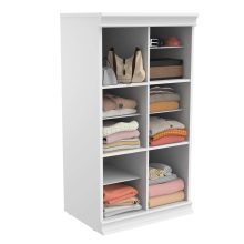 A sleek twelve-compartment laminated wood storage cabinet with a sturdy backer, shown in a bright and organized living space.