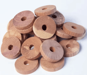 10-piece set of natural cedar blocks for moth protection and odor absorption, ideal for closets, drawers, and storage areas.