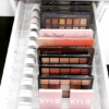 lear acrylic drawer dividers for IKEA Alex units, offering customizable makeup storage with multiple slots for eyeshadows, blushes, and beauty products.