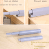 Gray and white cabinet door damper buffer for soft closing, ideal for kitchens and bathrooms.