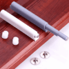 Gray and white cabinet door damper buffer for soft closing, perfect for kitchens and bathrooms.