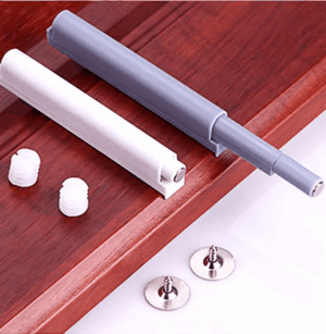 Gray and white cabinet door damper buffer for soft closing, perfect for kitchens and bathrooms.