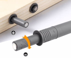 Soft close door dampers in white, grey, and black for quiet cabinet and drawer operation.