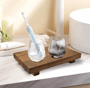 Wood bathroom vanity tray with anti-moisture design, perfect for organizing toiletries or displaying a plant vase in small spaces