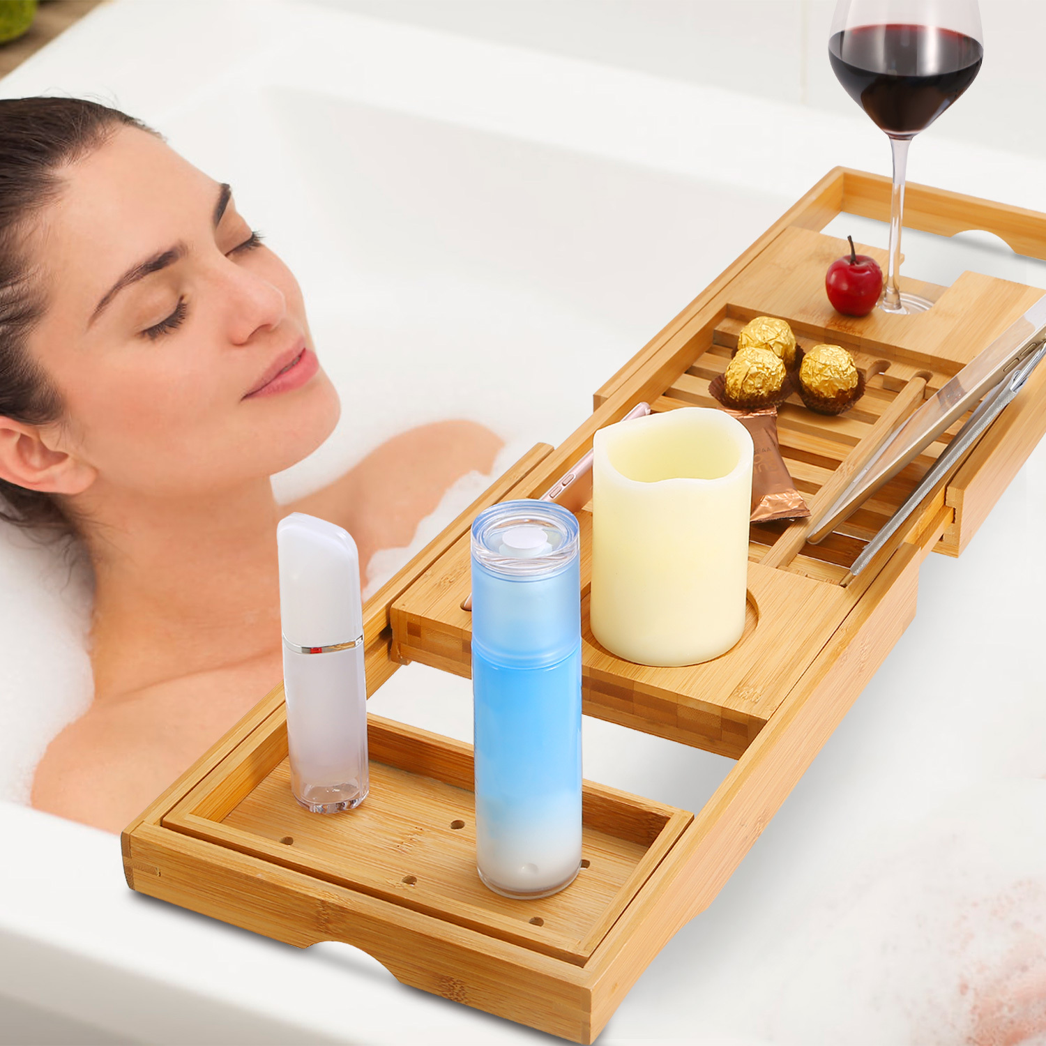 Relaxing Home Spa Setup with Candle, Lotion and Wine on Bamboo Bath Caddy