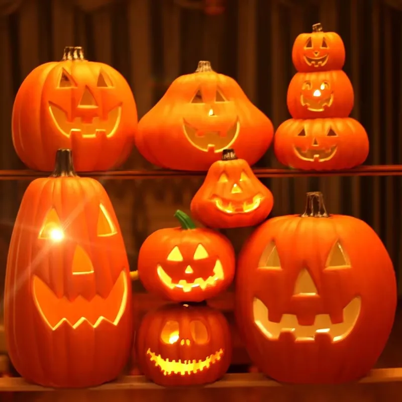 Warm Ambient Lit Jack-o'-Lantern Collection Displayed on Wooden Shelving