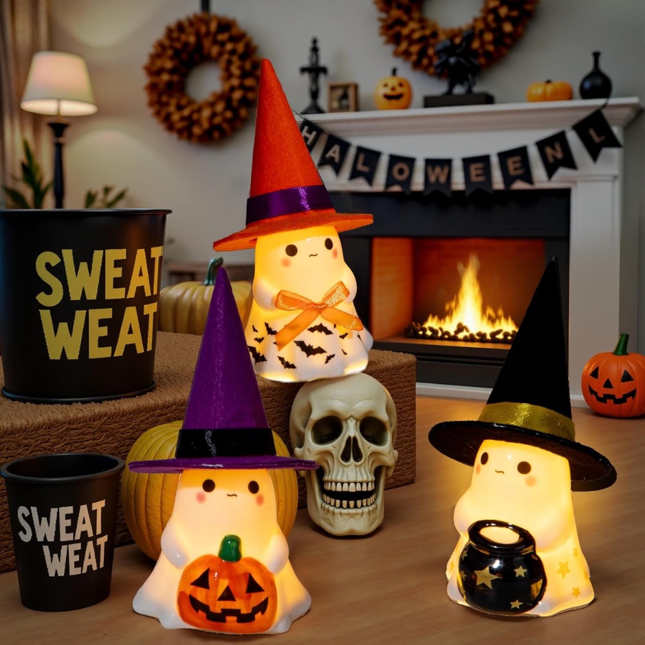 Ceramic Light-Up Ghost Trio Displayed in Living Room Fireplace Hearth Setting